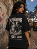Pressure Cooker 3 Seeti Club oversized tee in washed black, back print shown on model - Matchbox Society Drop 01