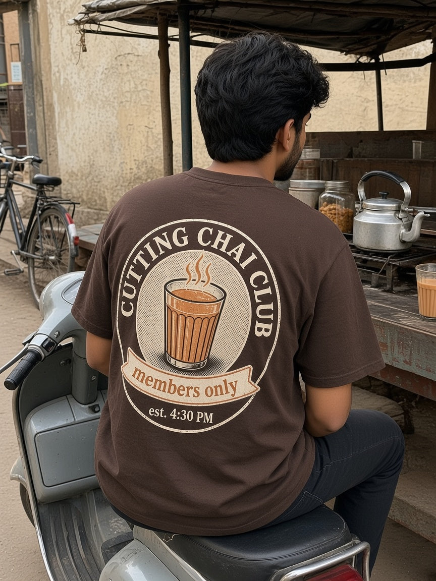 Cutting Chai Club oversized tee in brown, back print shown on model - Matchbox Society Drop 01